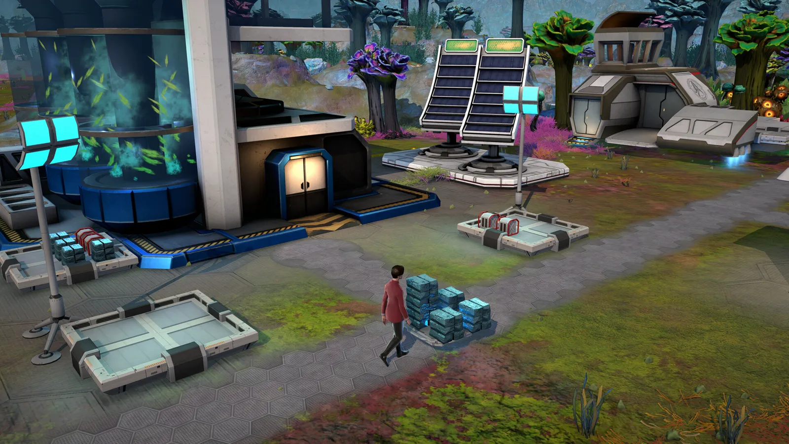 Steam screenshot close-up of a crew member in a red uniform walking past solar panels, a glass-fronted module and stacked crates